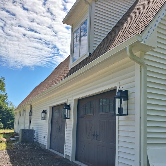 New-construction seamless gutter and downspout installation in Glastonbury Connecticut