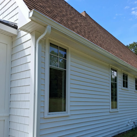 Completed white 6-inch gutter system on a Glastonbury Connecticut home