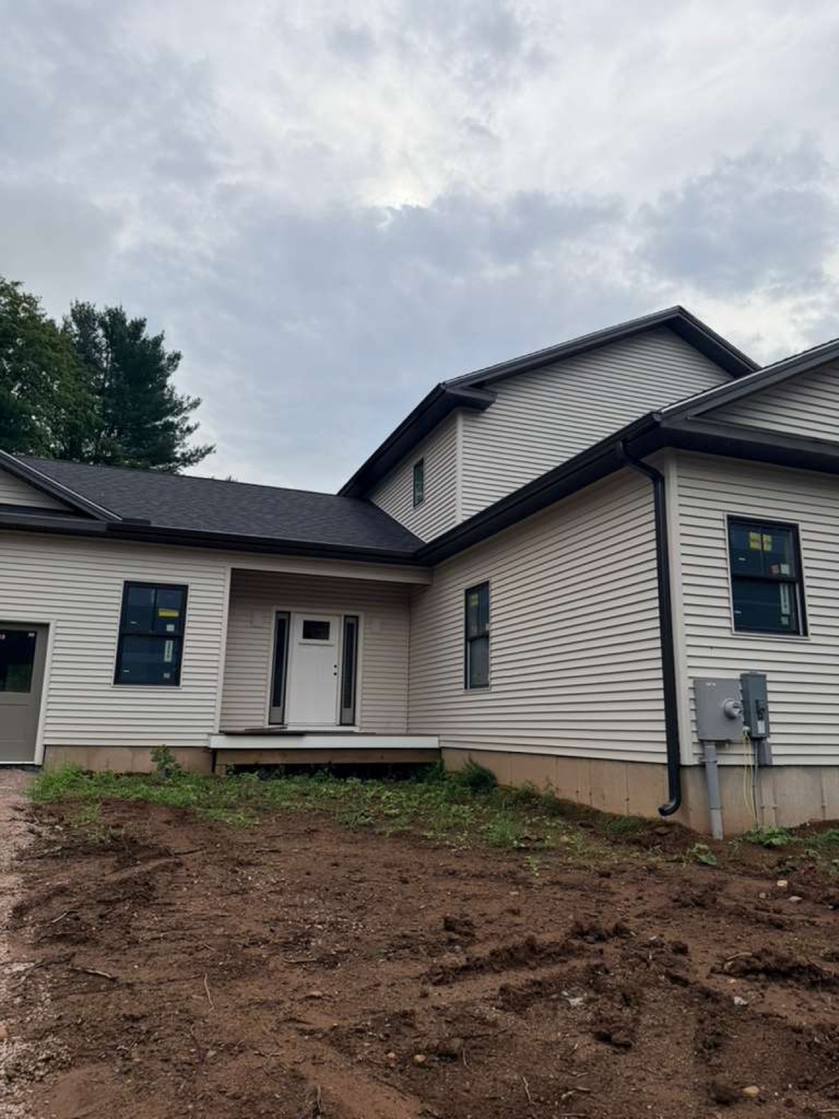 Musket Brown gutter and downspout system on Connecticut home