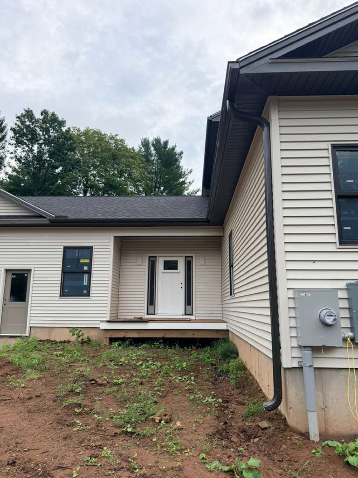 Professional K-style gutter corner and downspout installation